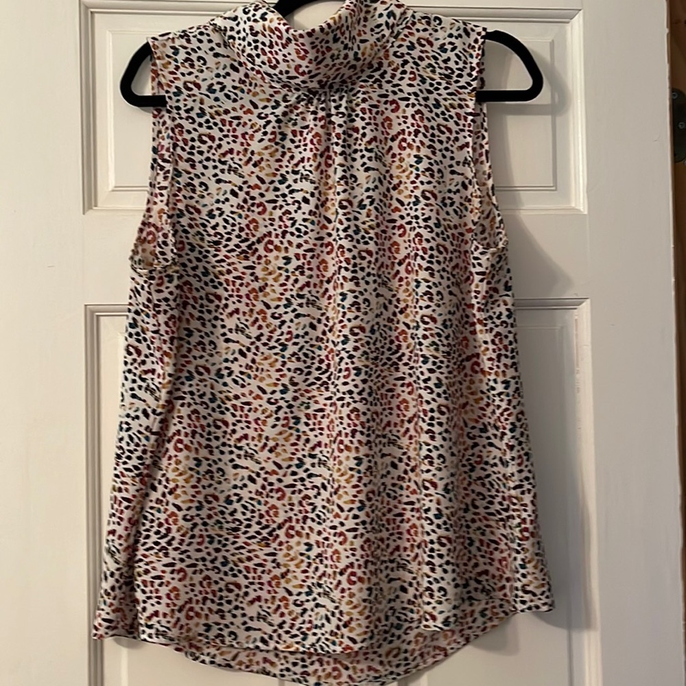 X-LARGE High Low sleeveless dress shirt.